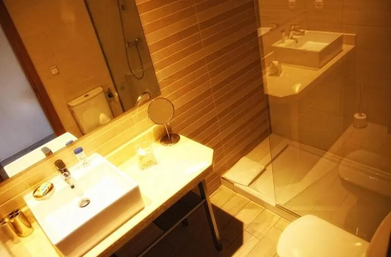 Bathroom washbasin and shower tray