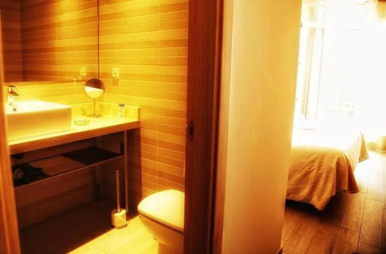 View of the bathroom from the corridor of the room